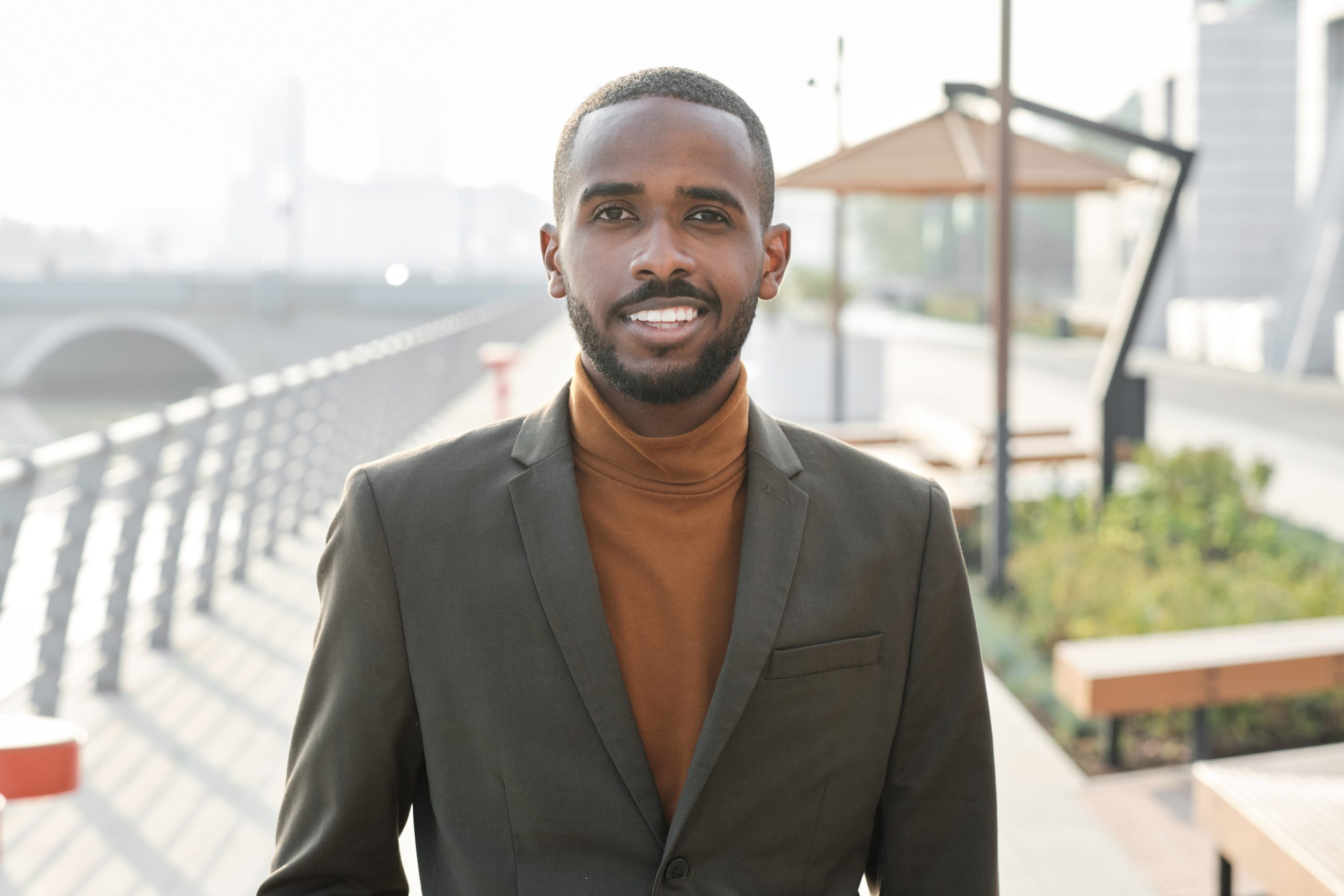 Bearded restaurateur in formal suit